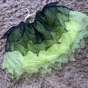 Black and green tutu w/black and white polka dot waist.